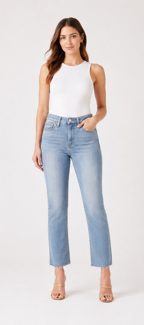 Levi's 724 High-Rise Slim Straight Women's Jeans Light Blue Frayed Hem Size 31 – model wearing
