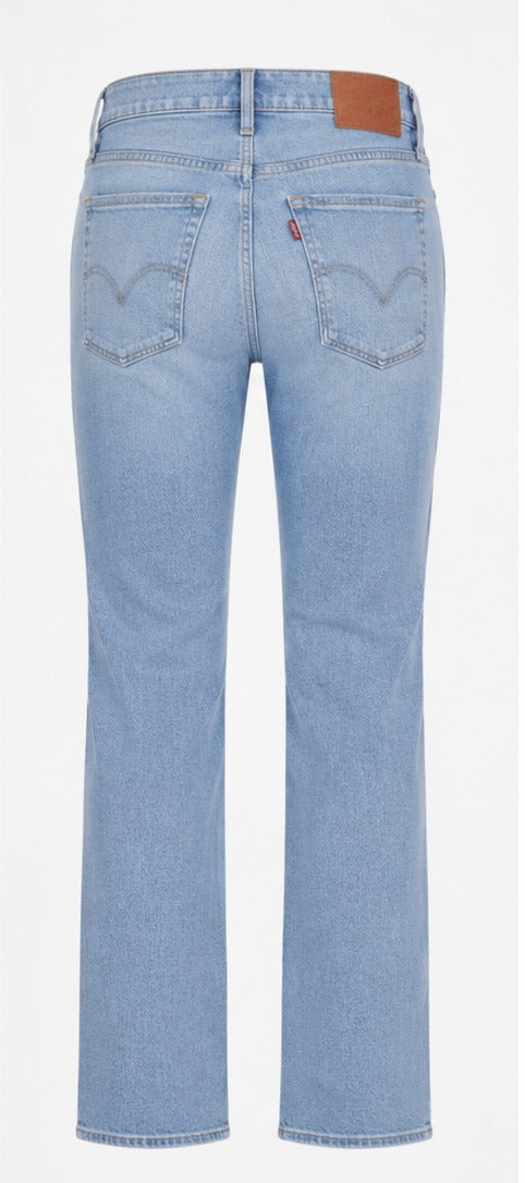 Levi's 724 High-Rise Slim Straight light blue wash back view – women's slim straight leg denim size 29