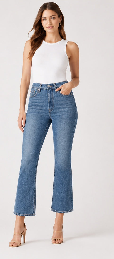 Model wearing Levi's Ribcage Bootcut Cropped Women's Jeans mid blue – super high rise cropped bootcut denim size 29