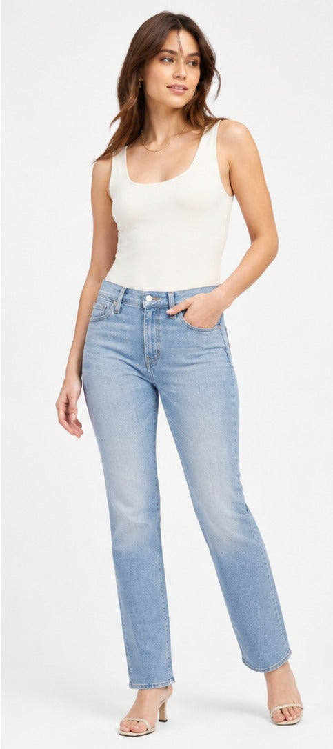 Model wearing Levi's 724 High-Rise Slim Straight light blue wash – women's slim straight leg denim size 29