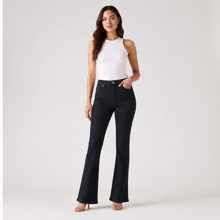 Levi's 725 High-Rise Bootcut Women's Jeans Dark Navy Size 27 – model wearing