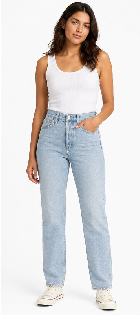 Model wearing Levi's Wedgie Straight light blue wash – women's high rise snug fit straight leg denim size 28